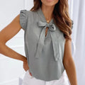 Tania | Mouwloze Blouse met Strikdetail en Polkadot voor Dames